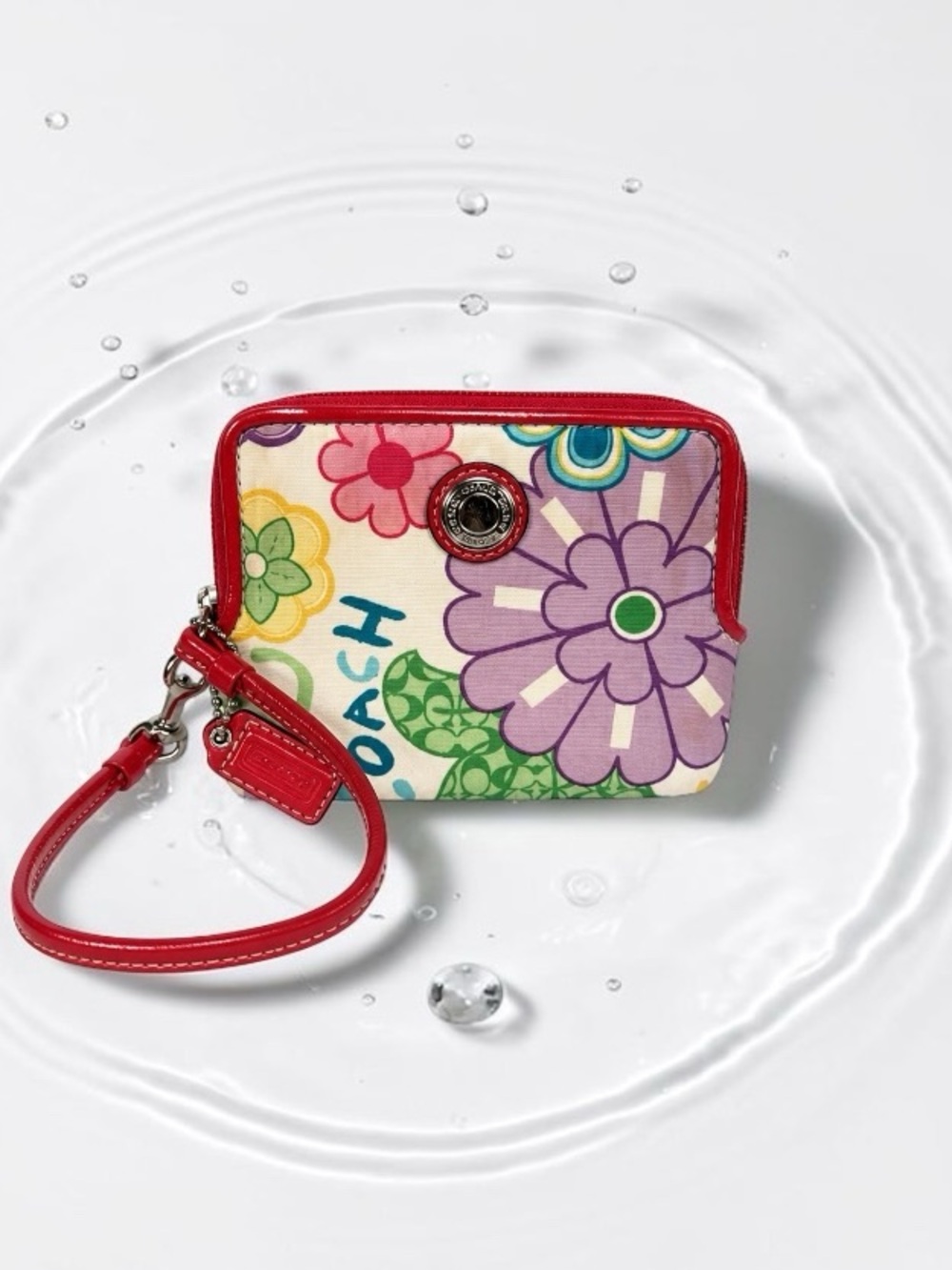 Coach Multicolor Floral Wristlet with Hot Pink Trim